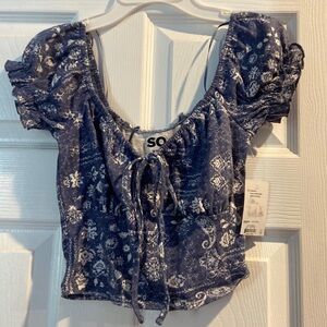 Blue and white xs top